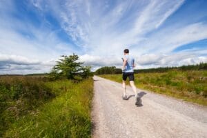 man running on road