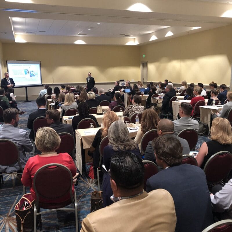 photo of audience in a conference room