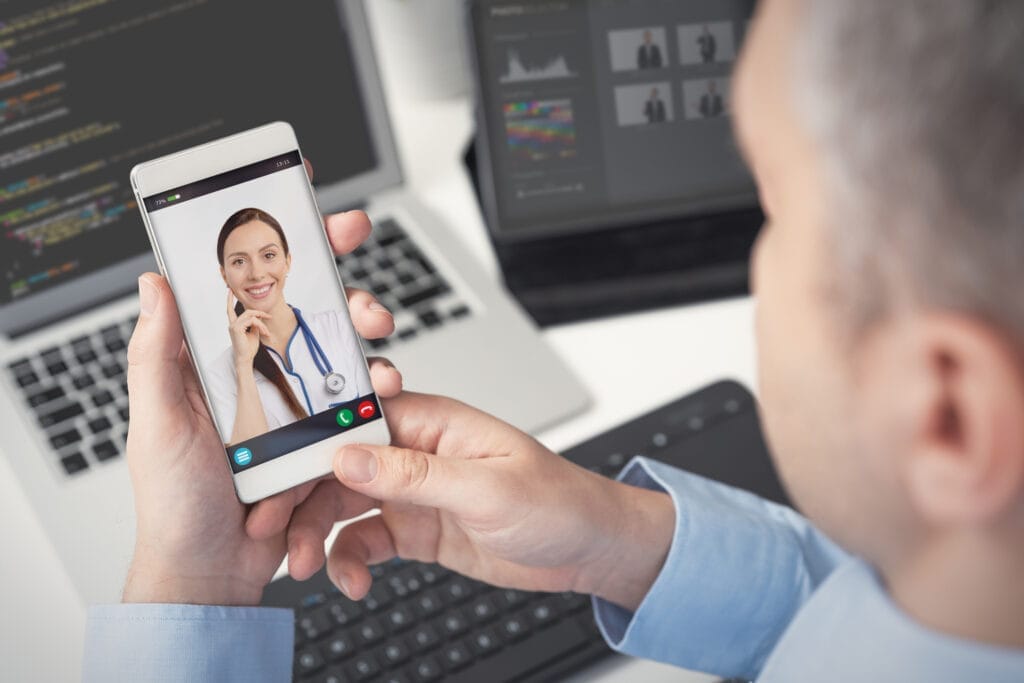 man having video call with woman on smartphone