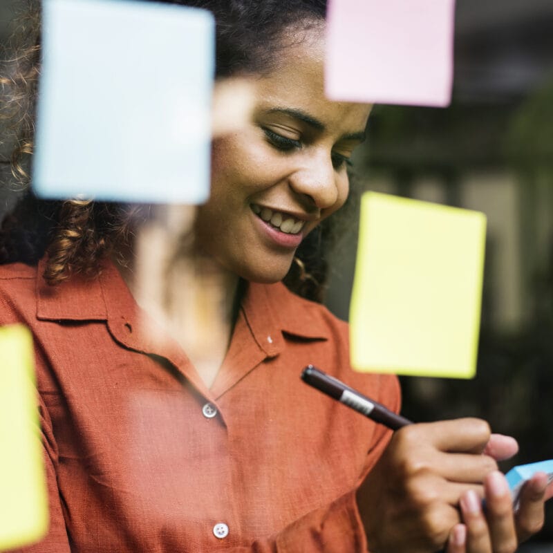 Businesspeople brainstorming ideas on self-service tools